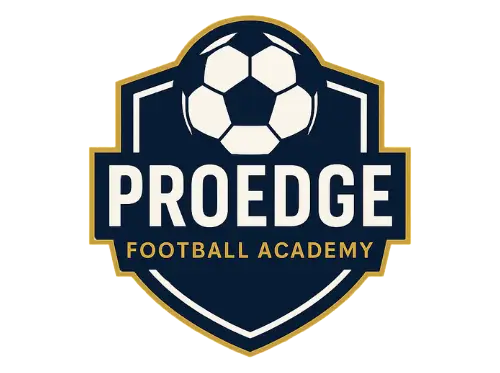 Football coach working with youth players at Proedge Football Academy in Farnborough